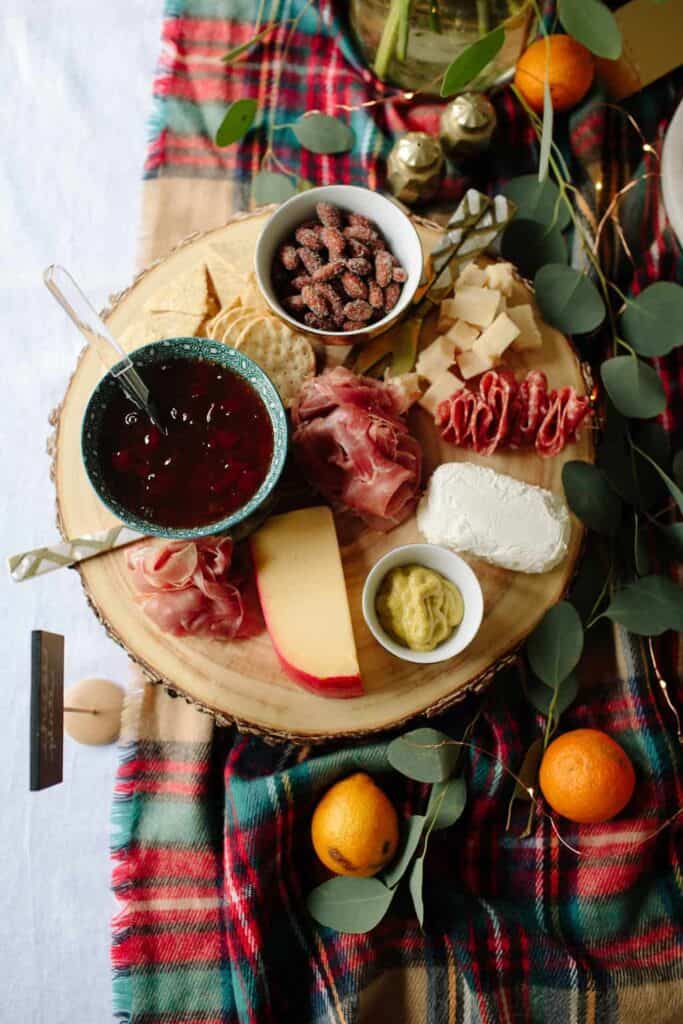 How to Host a Christmas Movie Marathon & Cookie Swap. Image of holiday charcuterie board.