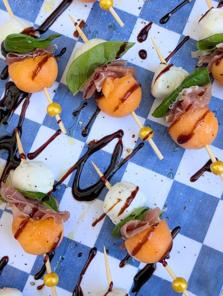 Melon and Prosciutto Skewers with mozzarella close up