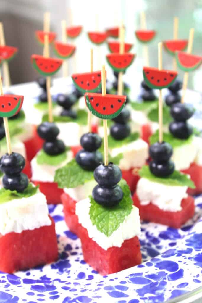 Close up image of assembled Watermelon Skewers with Feta, Mint and Blueberries