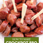 A close-up of a bowl of BBQ-coated smoked sausage bites, perfect for a party appetizer.