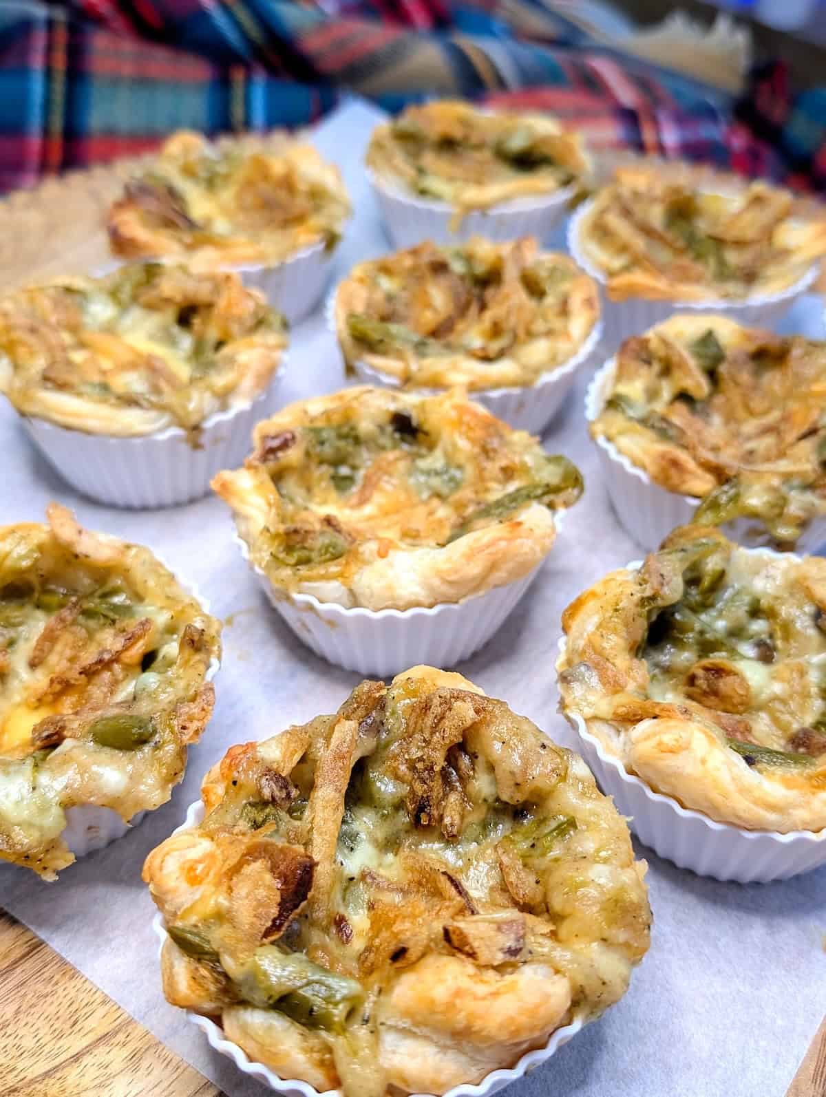 close up of mini green bean casseroles baked golden brown