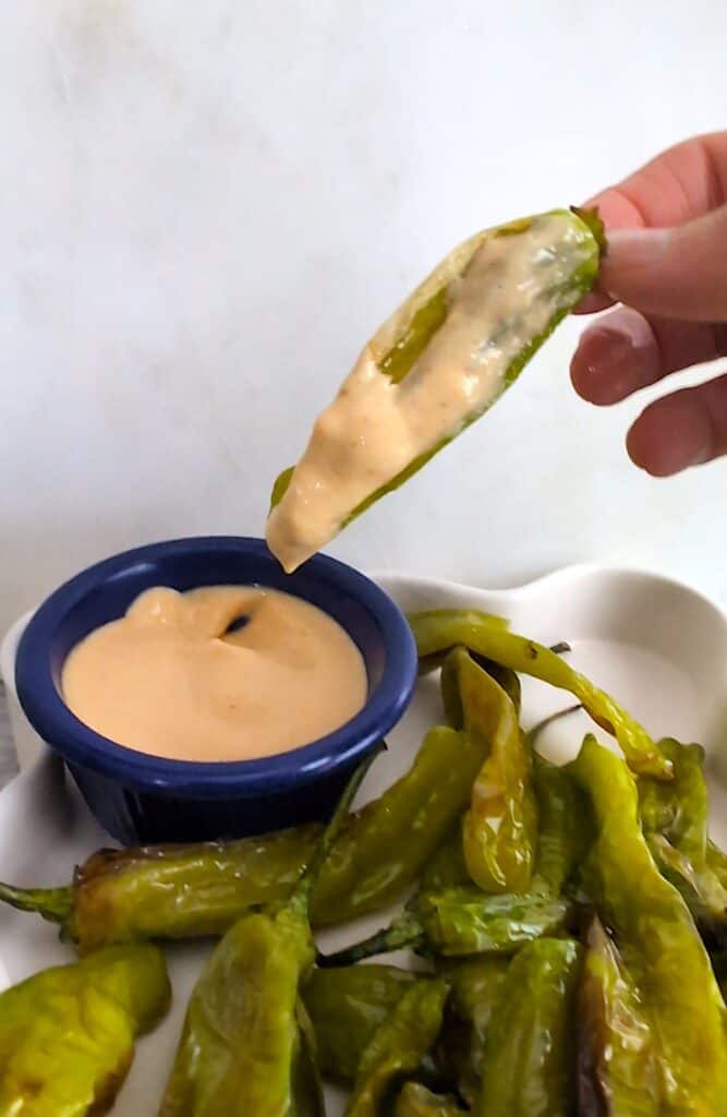 Air Fryer Shishito Peppers dipped in Creamy Sriracha Mayo