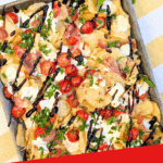 crispy caprese charcuterie chips with cherry tomatoes and basil