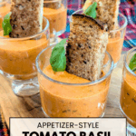 Recipe for easy semi-homemade Tomato Bisque Soup served as an appetizer shooter with a slice of grilled cheese.