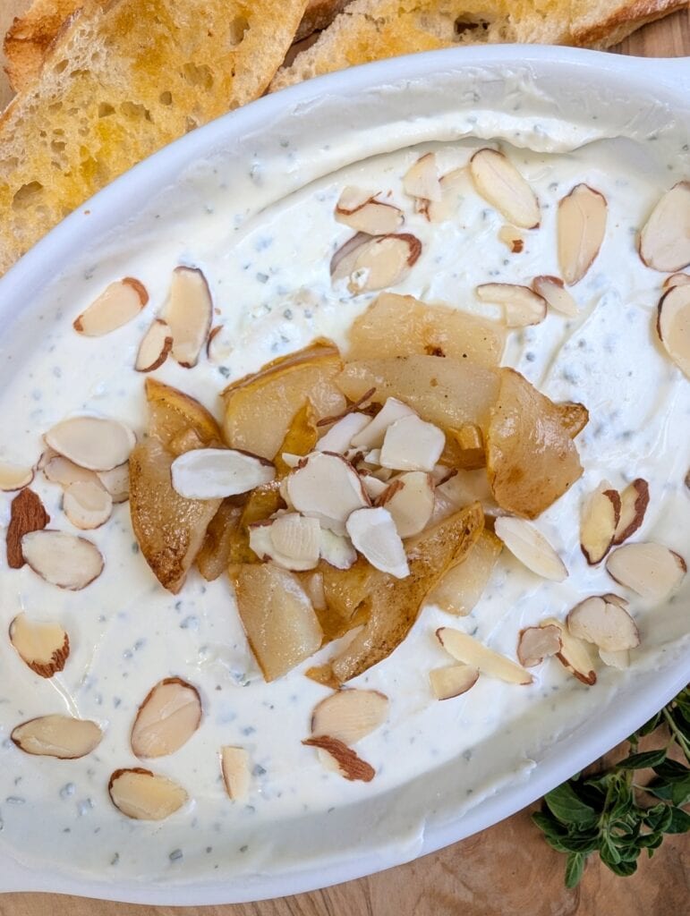 Creamy Whipped Goat Cheese Dip with Honey and Herbs ready to serve