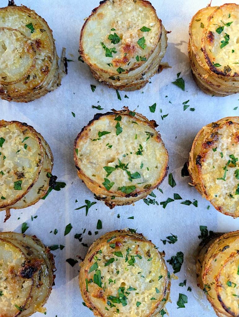 overhead close up of baked garlic & parmesan crispy potato stacks 
