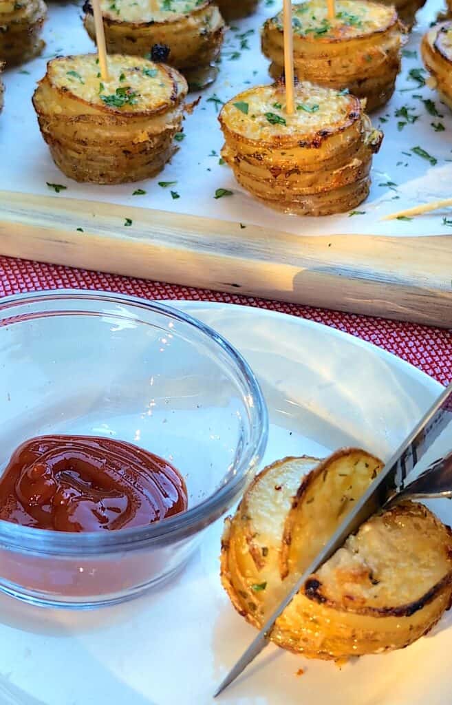 cutting the crispy potato stack