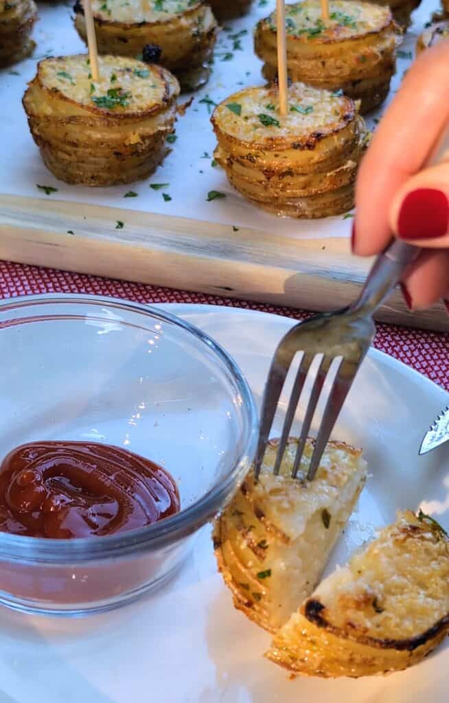 about to pick up the crispy potato stack with a fork