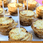 A close-up shot of several individual servings of baked Crispy Potato Stacks dusted with Parmesan cheese and herbs, each secured with a gold-tipped appetizer pick. Text overlay reads: "How to Make Crispy Potato Stacks, Garlic & Parmesan."