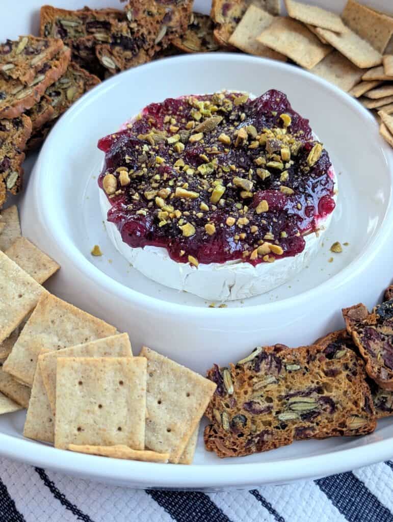 Easy Baked Brie with Cranberry Sauce and Pistachios