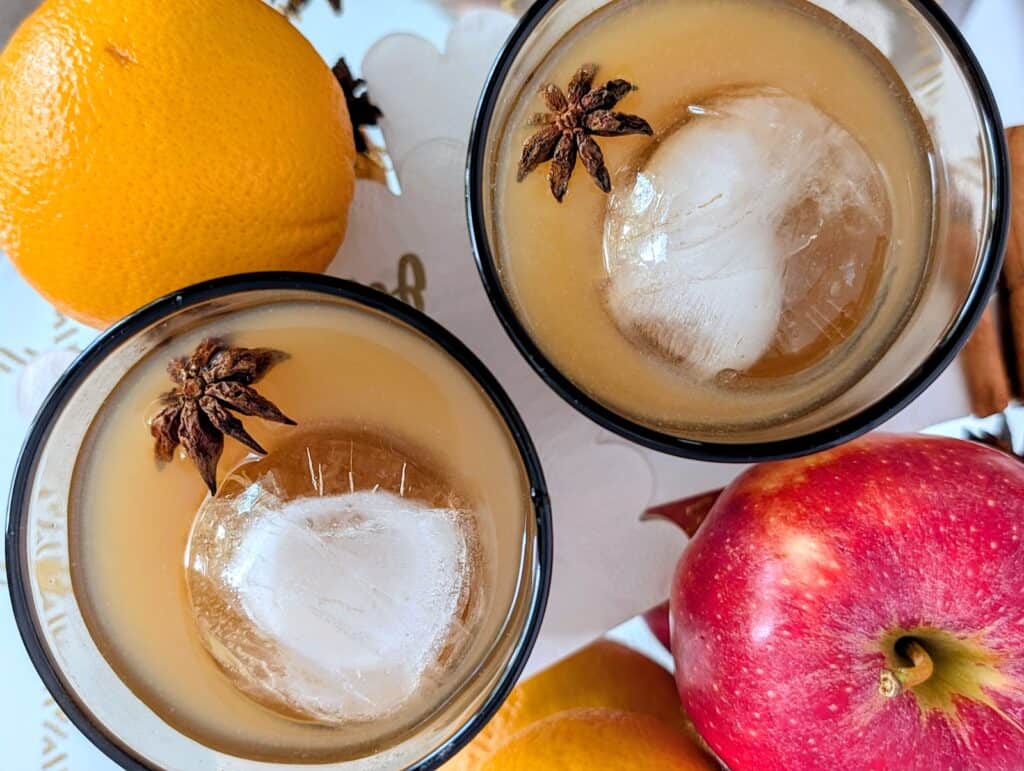 Spiked Fireball Apple Cider cocktail overhead shot of two glasses