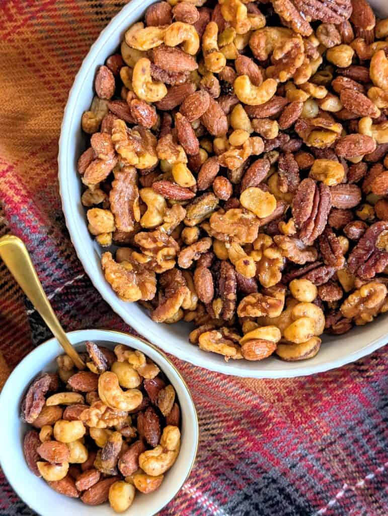 Candied Sweet and Spicy Nuts close up overhead of two bowls