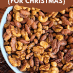 Easy and delicious Candied Nuts Recipe for Christmas. A large white bowl is filled with a sweet and spicy mix of candied pecans, walnuts, cashews, and almonds.