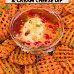 Crispy sweet potato waffle fries served around a bowl of cream cheese topped with pepper jelly.