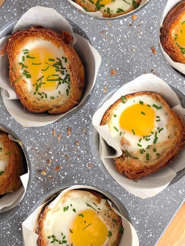 close up overhead of Breakfast Croissant Egg Cups in muffin tin