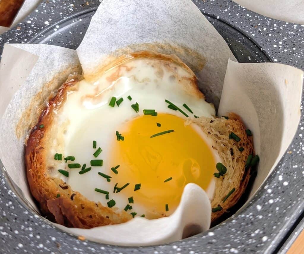 close up of baked Breakfast Croissant Egg Cup